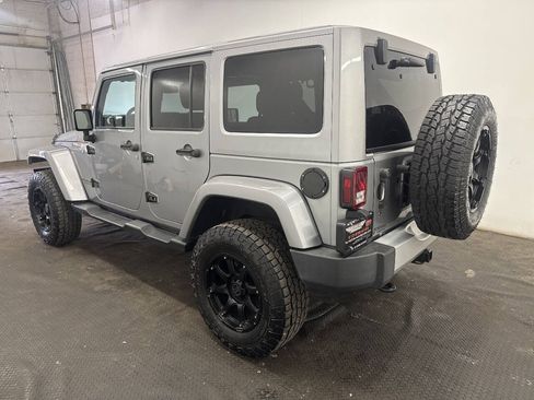 Used 2015 Jeep Wrangler Unlimited Sahara w/ Dual Top Group AWD/4WD image 4