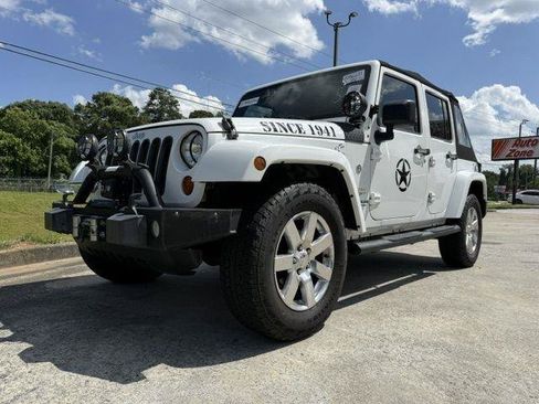 Used 2013 Jeep Wrangler Unlimited Sahara w/ Dual Top Group AWD/4WD image 3