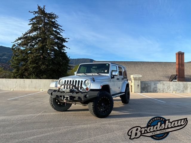 Used 2010 Jeep Wrangler Unlimited Sahara w/ Dual Top Group AWD/4WD image 1