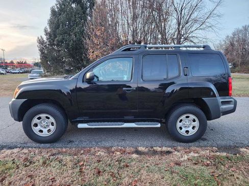 Used 2012 Nissan Xterra X image 1