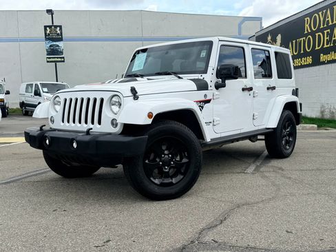 Used 2015 Jeep Wrangler Unlimited Sahara AWD/4WD image 1