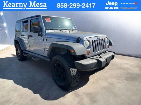 Used 2013 Jeep Wrangler Unlimited Sport image 1