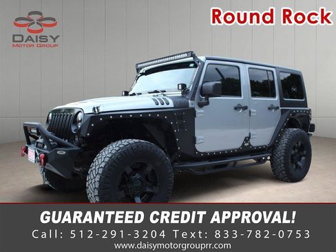 Used 2013 Jeep Wrangler Unlimited Sahara w/ Connectivity Group AWD/4WD image 1