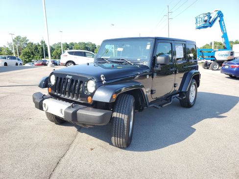 Used 2012 Jeep Wrangler Unlimited Sahara w/ Dual Top Group AWD/4WD image 2