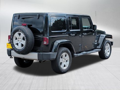 Used 2012 Jeep Wrangler Unlimited Sahara w/ Dual Top Group AWD/4WD image 7