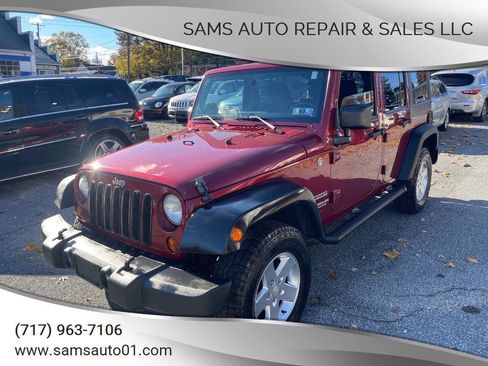 Used 2013 Jeep Wrangler Unlimited Sport image 1