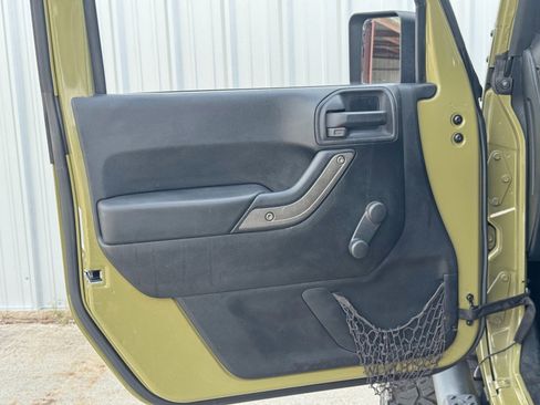 Used 2013 Jeep Wrangler Unlimited Sport w/ Mopar Black Appearance Group image 33