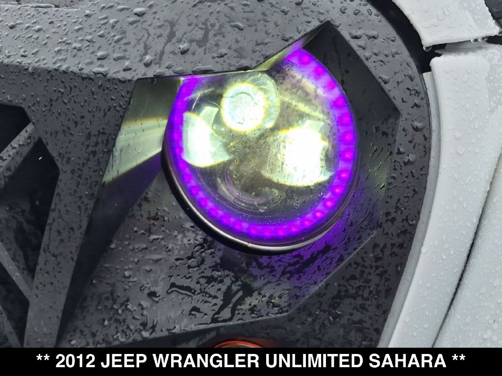Used 2012 Jeep Wrangler Unlimited Sahara w/ Dual Top Group AWD/4WD image 14