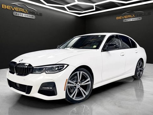 Used 2021 BMW 330i xDrive Sedan w/ M Sport Package AWD/4WD image 1