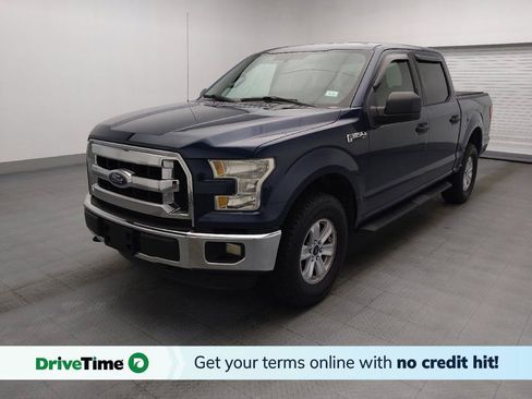 Used 2015 Ford F150 XLT AWD/4WD image 1