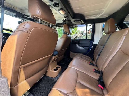 Used 2013 Jeep Wrangler Unlimited Sahara w/ Dual Top Group AWD/4WD image 19