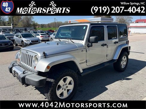 Used 2012 Jeep Wrangler Unlimited Sahara w/ Connectivity Group image 1