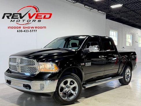 Used 2014 RAM 1500 Laramie AWD/4WD image 1