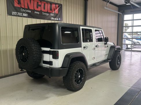 Used 2011 Jeep Wrangler Unlimited Rubicon w/ Dual Top Group AWD/4WD image 6