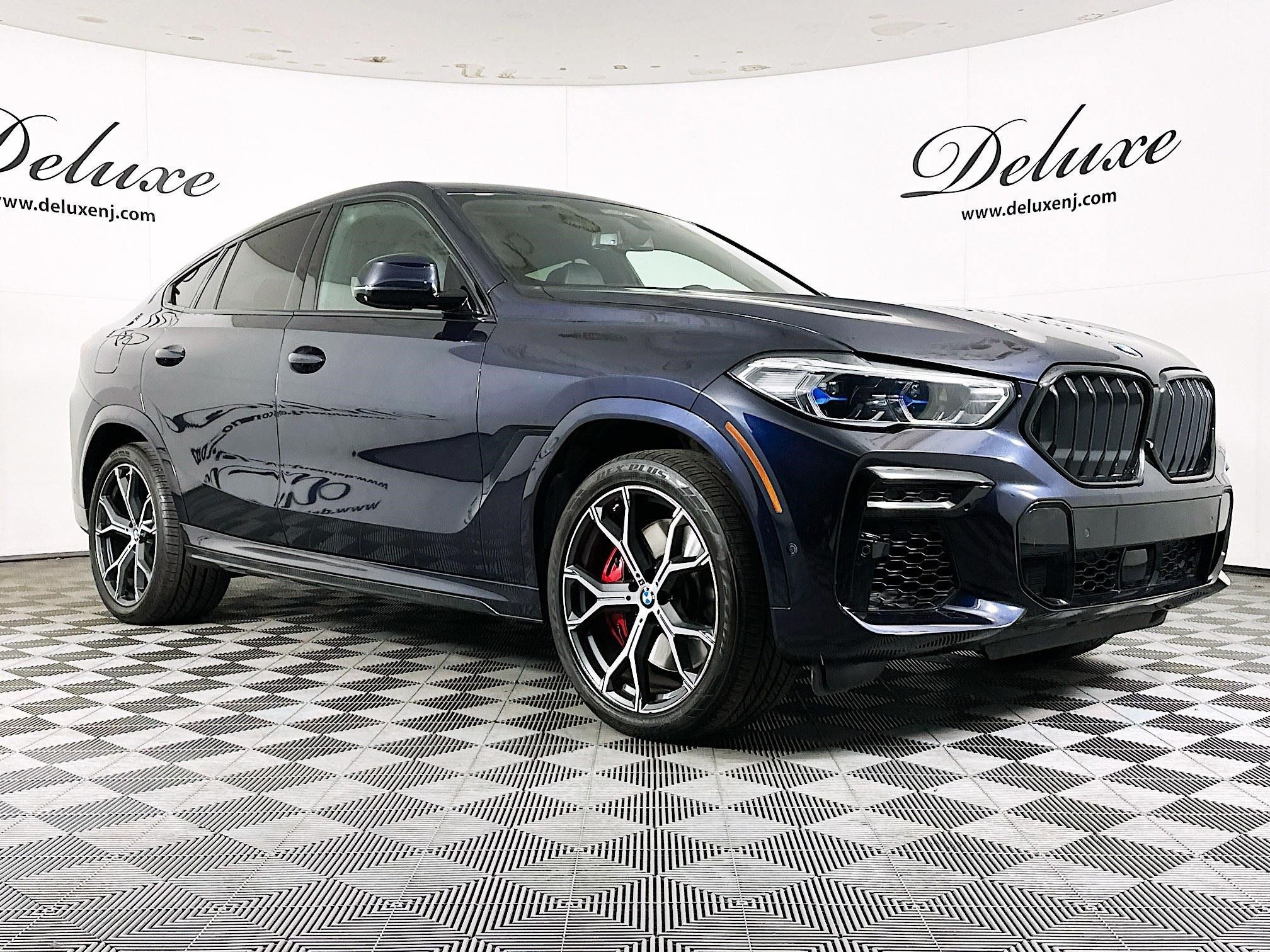 Used 2022 BMW X6 M50i AWD/4WD image 1