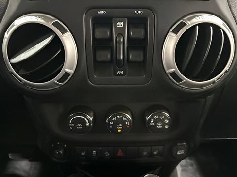 Used 2013 Jeep Wrangler Unlimited Sahara w/ Dual Top Group AWD/4WD image 21