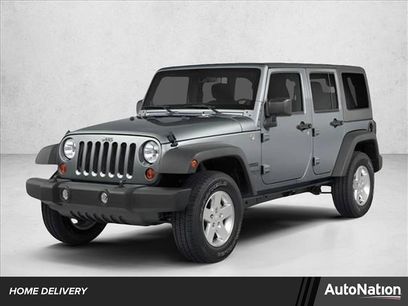 Used 2014 Jeep Wrangler Unlimited Sahara w/ Dual Top Group