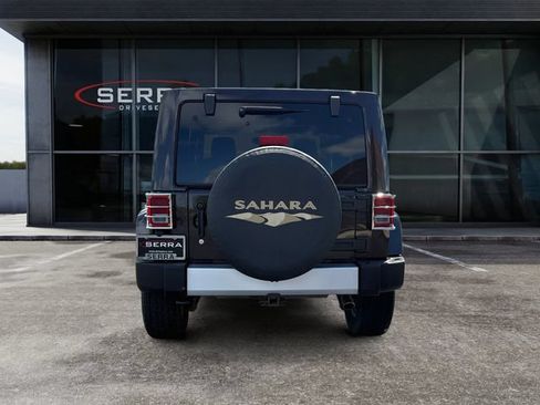 Used 2013 Jeep Wrangler Unlimited Sahara w/ Mopar Chrome Edition Group AWD/4WD image 4