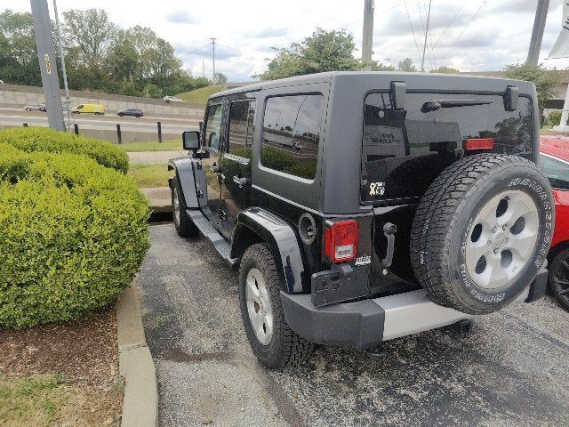 Used 2014 Jeep Wrangler Unlimited Sahara w/ Dual Top Group AWD/4WD image 6