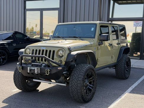 Used 2013 Jeep Wrangler Unlimited Rubicon w/ Dual Top Group AWD/4WD image 2