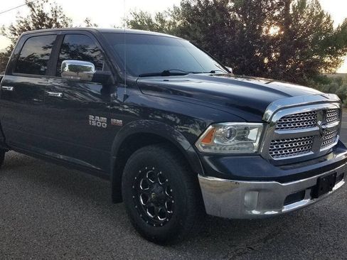 Used 2015 RAM 1500 Laramie w/ Convenience Group AWD/4WD image 1