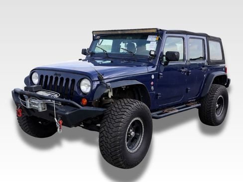 Used 2013 Jeep Wrangler Unlimited Sport w/ Trailer Tow Group AWD/4WD image 1