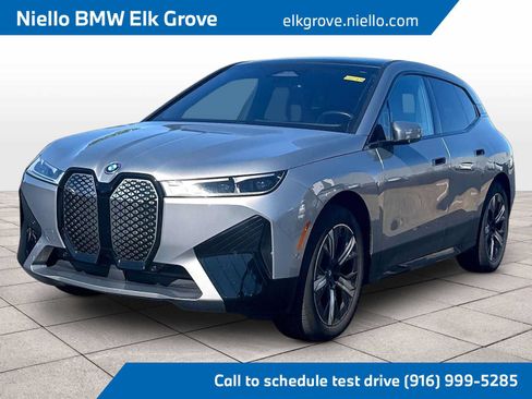 Used 2024 BMW iX xDrive50 w/ Sport Package AWD/4WD image 1