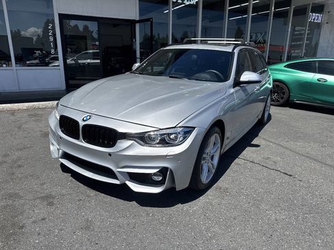 Used 2017 BMW 330i xDrive Wagon AWD/4WD image 1
