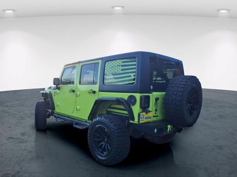 Used 2016 Jeep Wrangler Unlimited Sahara w/ Dual Top Group AWD/4WD image 9