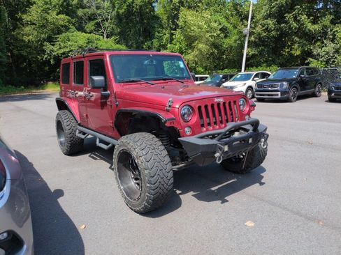 Used 2013 Jeep Wrangler Unlimited Sahara w/ Connectivity Group AWD/4WD image 1