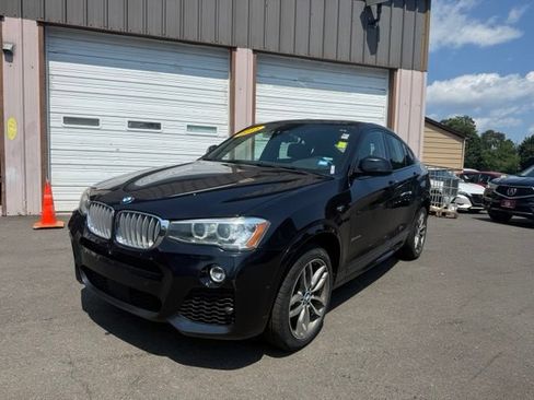 Used 2015 BMW X4 xDrive35i AWD/4WD image 1