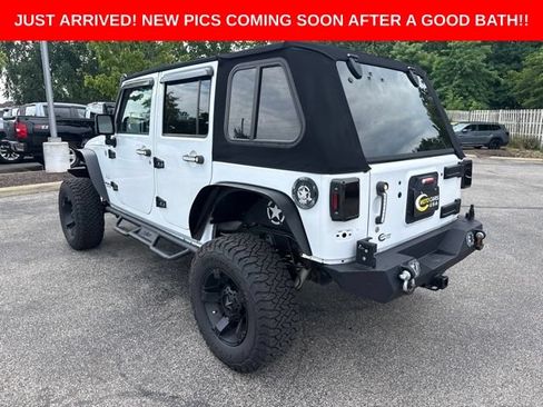 Used 2013 Jeep Wrangler Unlimited Sahara w/ Dual Top Group AWD/4WD image 3