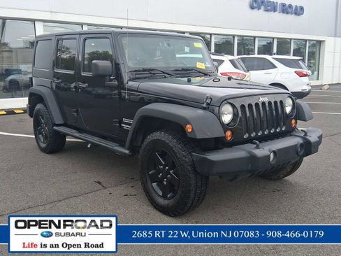Used 2011 Jeep Wrangler Unlimited Sport AWD/4WD image 1