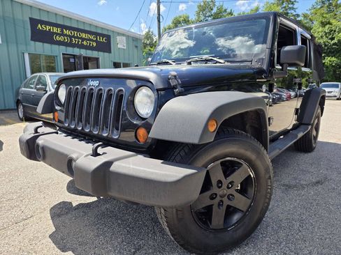 Used 2013 Jeep Wrangler Unlimited Sport AWD/4WD image 2