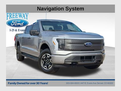 Used 2023 Ford F150 Lightning XLT AWD/4WD image 1