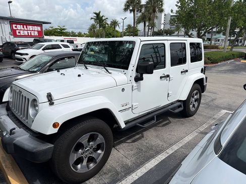 Used 2017 Jeep Wrangler Unlimited Sahara AWD/4WD image 1