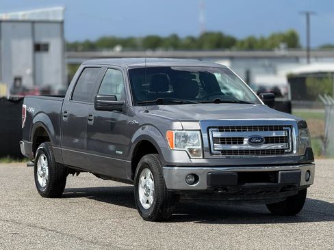 Used 2014 Ford F150 XLT AWD/4WD image 1