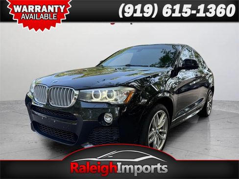 Used 2016 BMW X4 xDrive35i AWD/4WD image 1