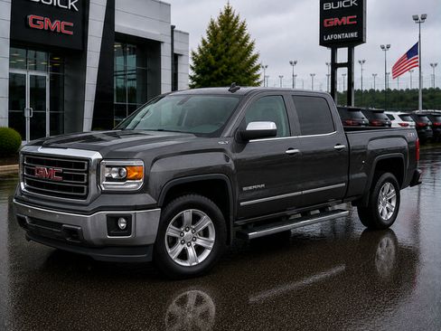 Used 2015 GMC Sierra 1500 SLT w/ SLT Crew Cab Value Package AWD/4WD image 1