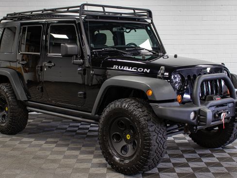 Used 2013 Jeep Wrangler Unlimited Rubicon w/ Dual Top Group AWD/4WD image 1