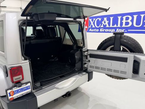 Used 2014 Jeep Wrangler Unlimited Sahara w/ Max Tow Package AWD/4WD image 24