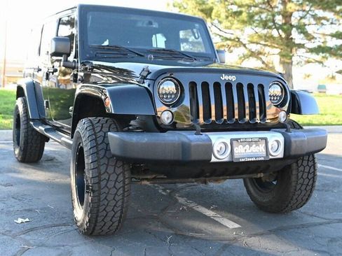 Used 2015 Jeep Wrangler Unlimited Sahara w/ Dual Top Group AWD/4WD image 17
