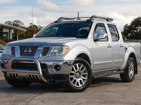 Used 2012 Nissan Frontier SL image 1