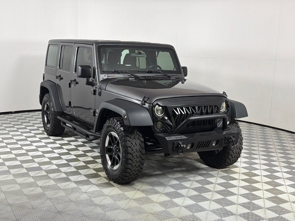 Used 2014 Jeep Wrangler Unlimited Sport w/ Connectivity Group AWD/4WD image 3
