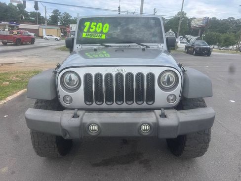 Used 2014 Jeep Wrangler Unlimited Rubicon w/ Dual Top Group AWD/4WD image 9