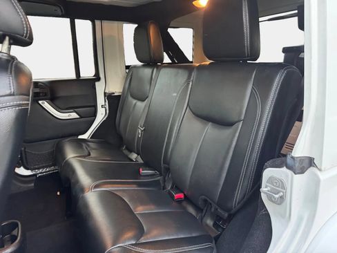 Used 2015 Jeep Wrangler Unlimited Sahara w/ Dual Top Group AWD/4WD image 11