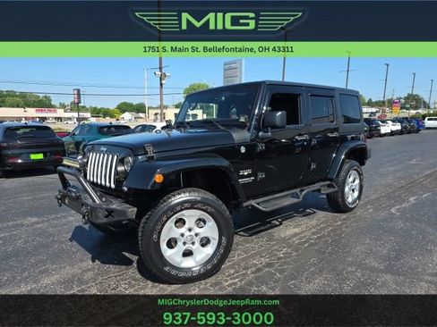 Used 2016 Jeep Wrangler Unlimited Sahara w/ Dual Top Group AWD/4WD image 1