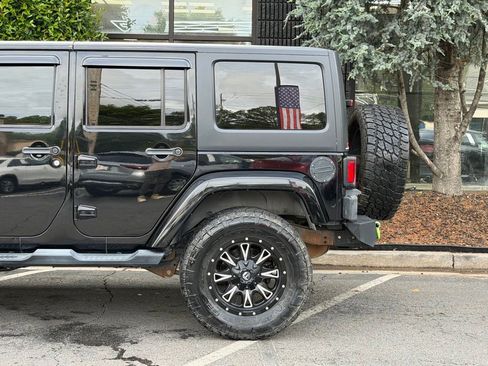 Used 2013 Jeep Wrangler Unlimited Sahara w/ Connectivity Group AWD/4WD image 11