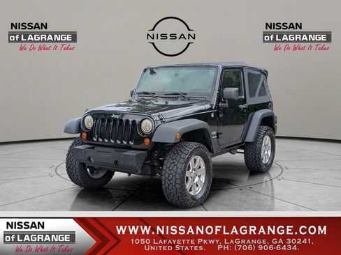 Used 2013 Jeep Wrangler Sport AWD/4WD image 1