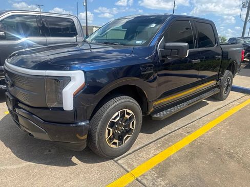 Used 2023 Ford F150 Lightning XLT AWD/4WD image 1